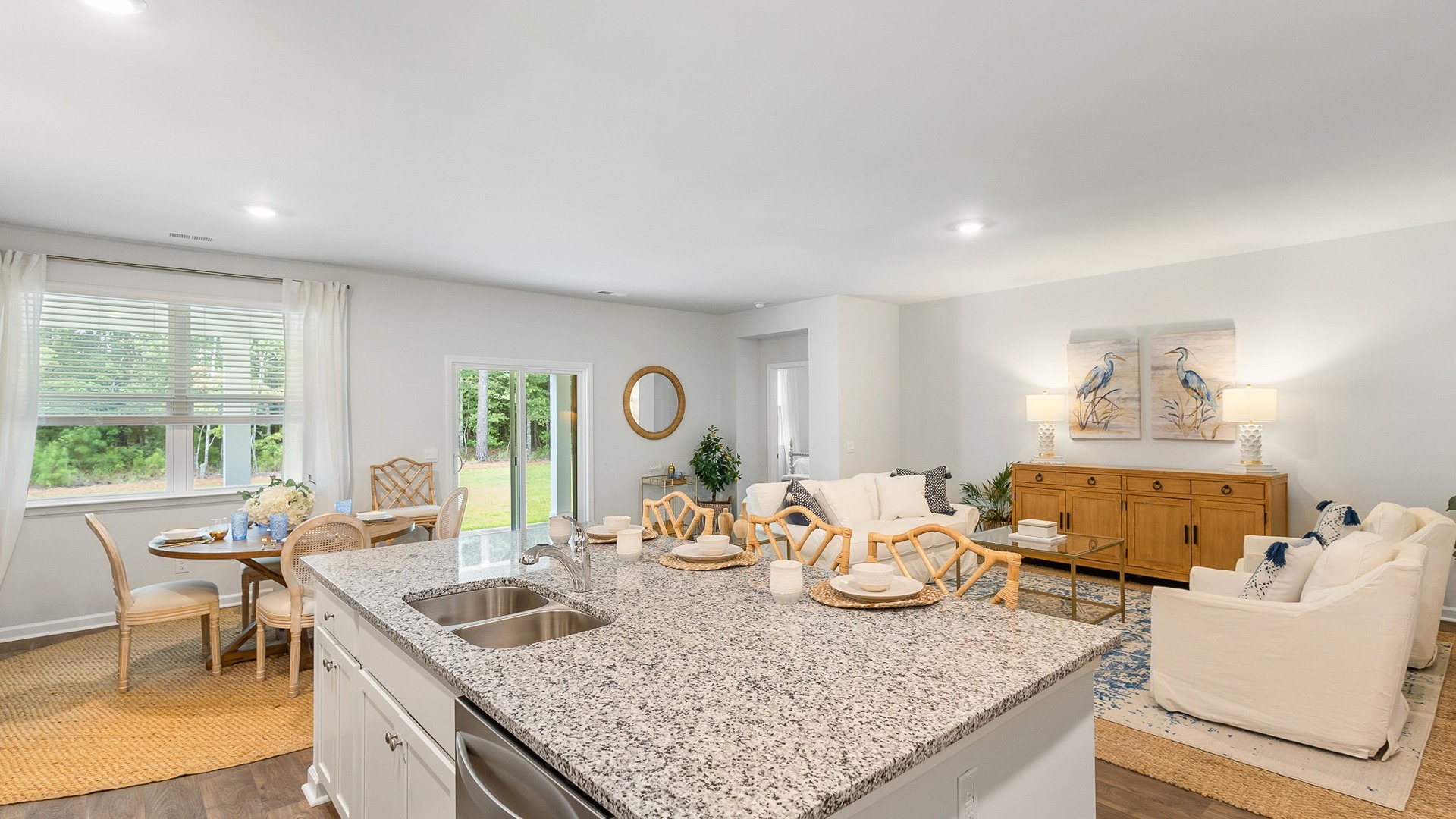 The floating kitchen island overlooks the living and dining areas.