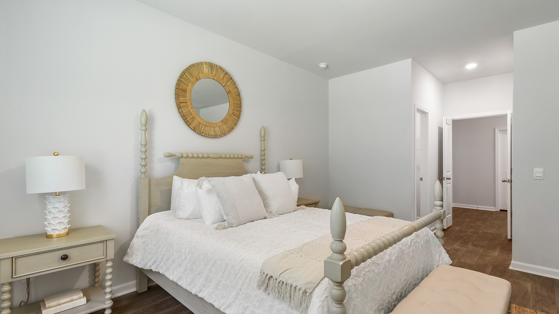 The primary suite is tucked into the rear of the home off the living space.