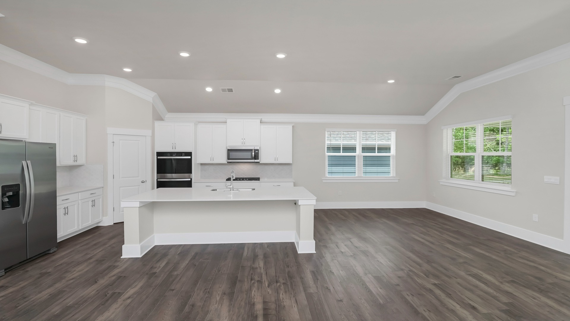 Open kitchen and dining areas
