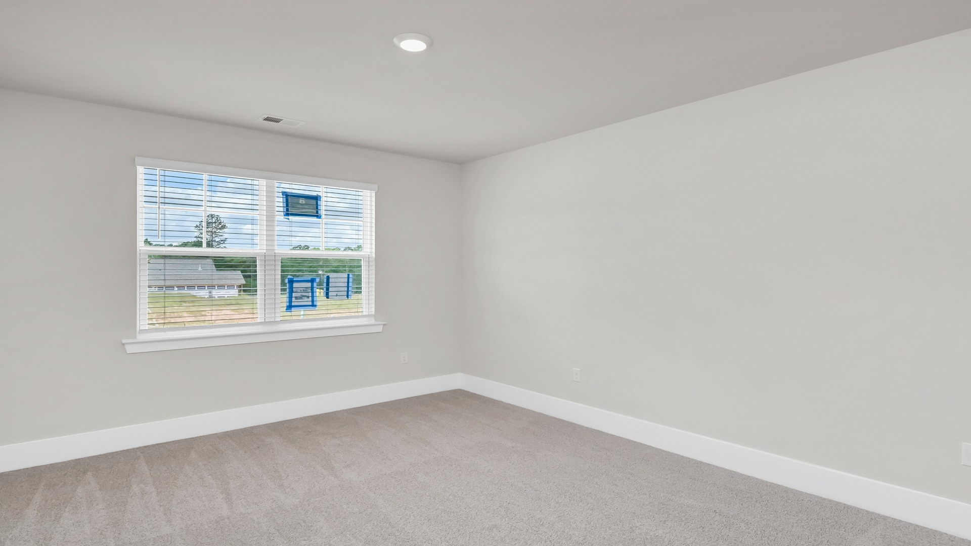 Front bedroom 2 with a large front facing window