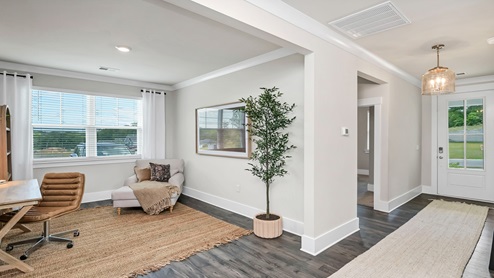 Back at the front foyer of the home, there is a flex space.