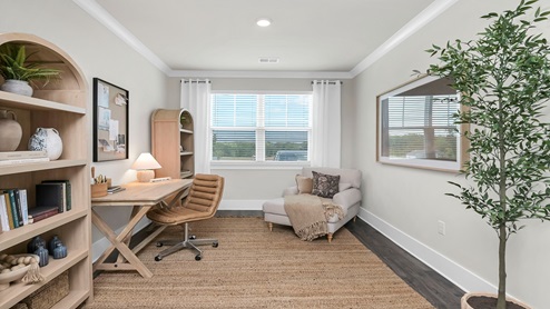 The flex space is staged as a home office but could be used as a formal dining area.