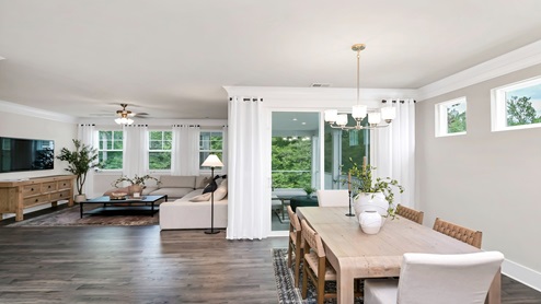 The dining and living areas are open concept design.