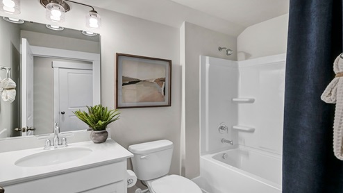Upstairs bathroom near the bedroom.