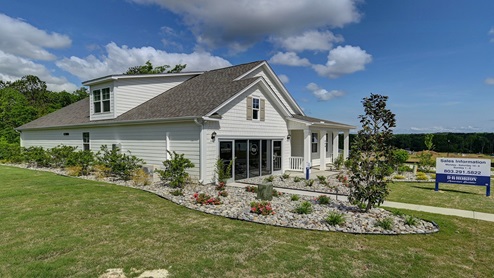 This home also features a covered front porch.