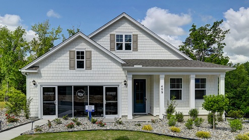 Two-story Model Home in Cross Creek featuring a glass store front.