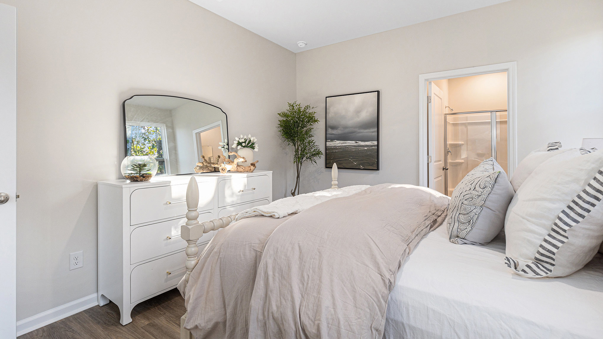 Primary bedroom with feature carpet flooring