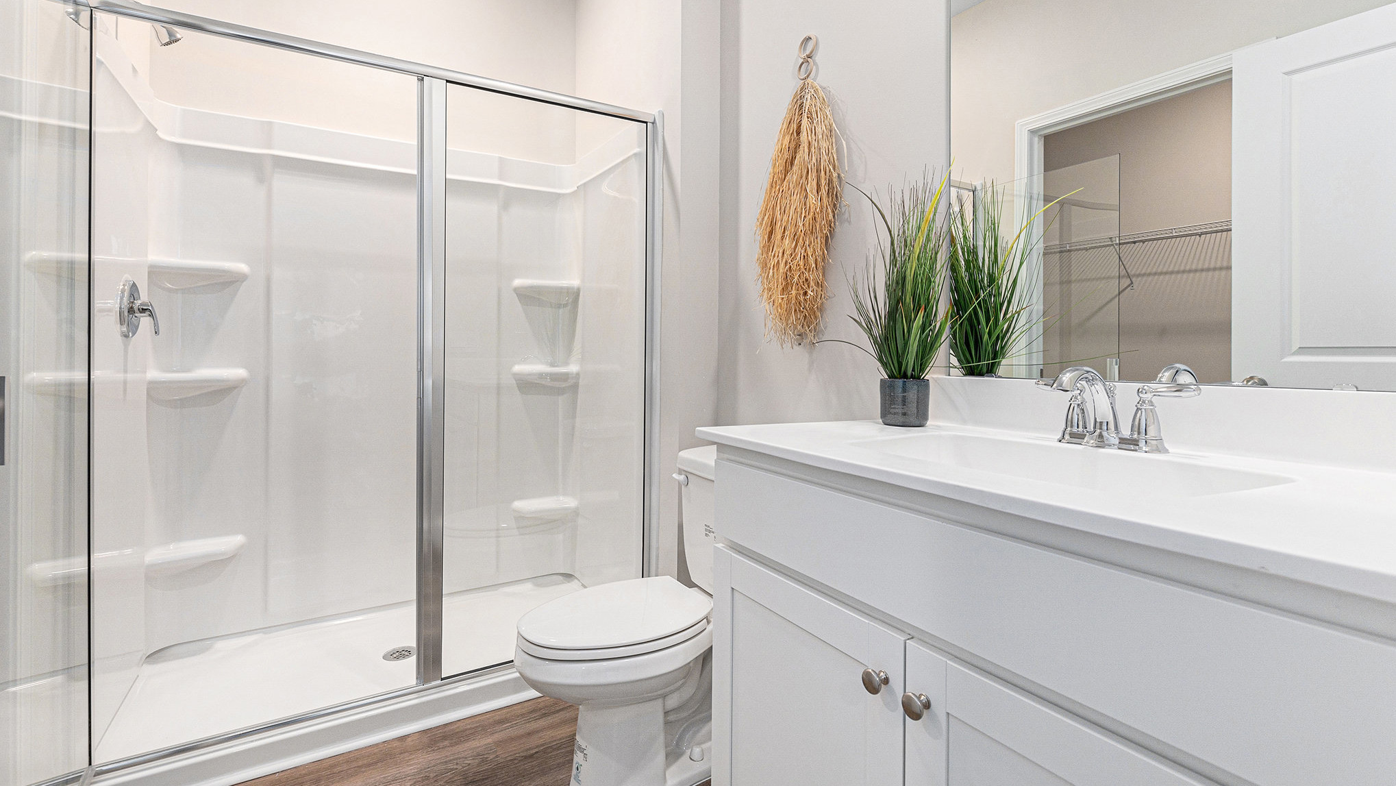 En-suite primary bathroom with standup shower