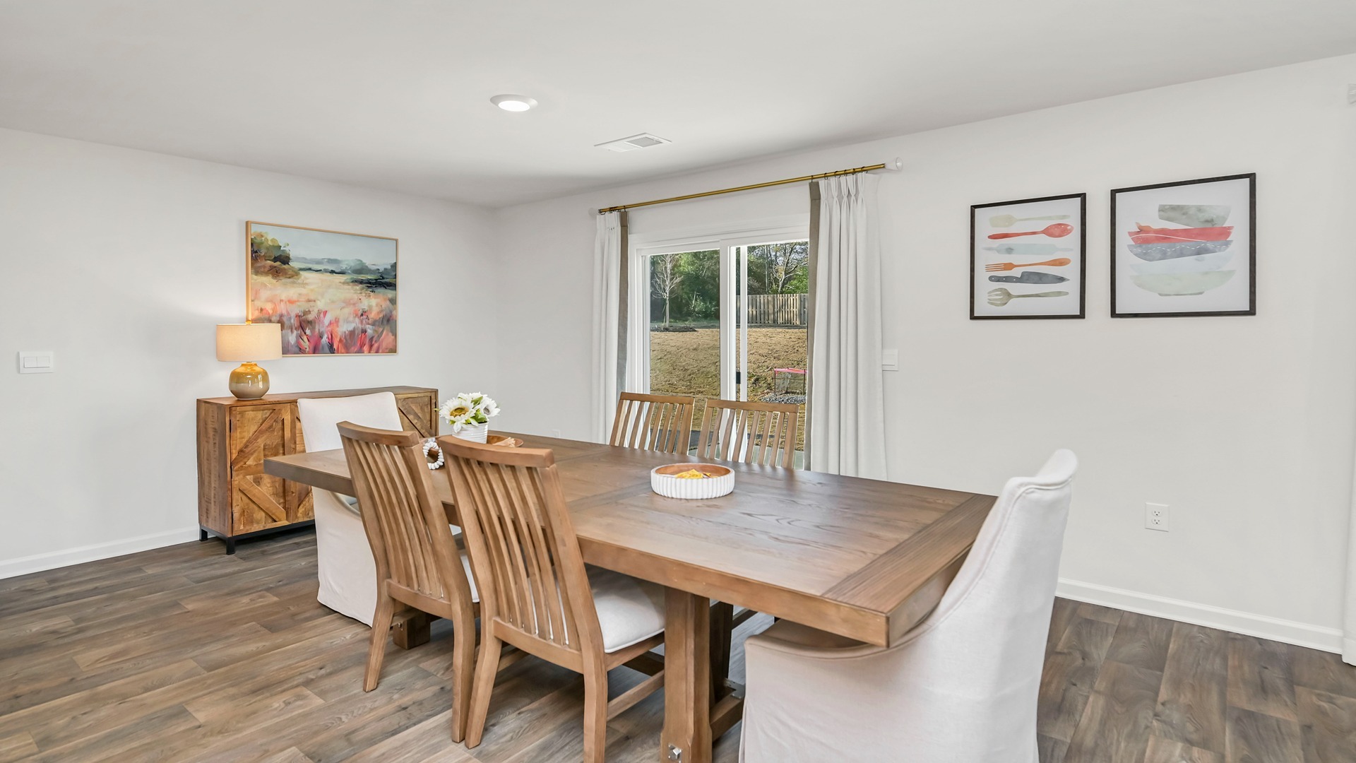 Aisle dining area with access to back patio