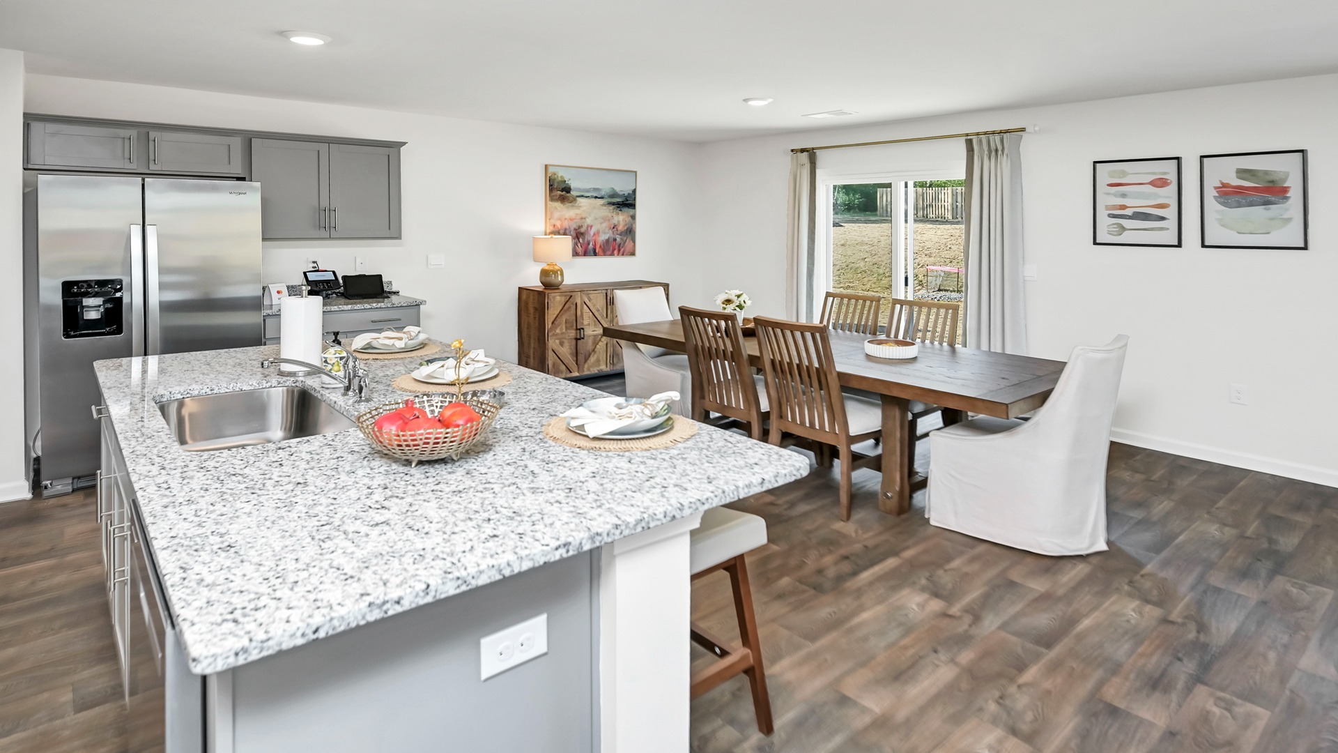 Open concept kitchen and dining areas
