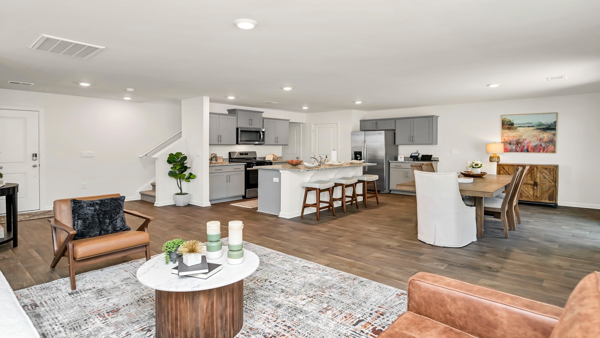 View of kitchen and dining area from living area