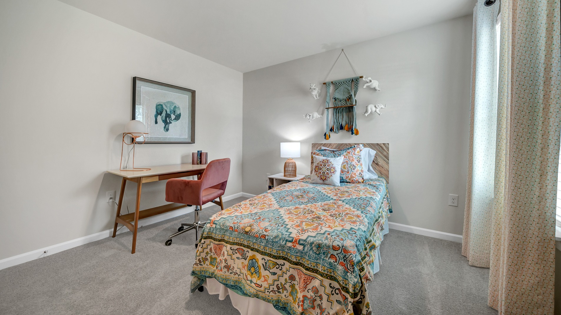 Bedroom 4 with carpet flooring and a window