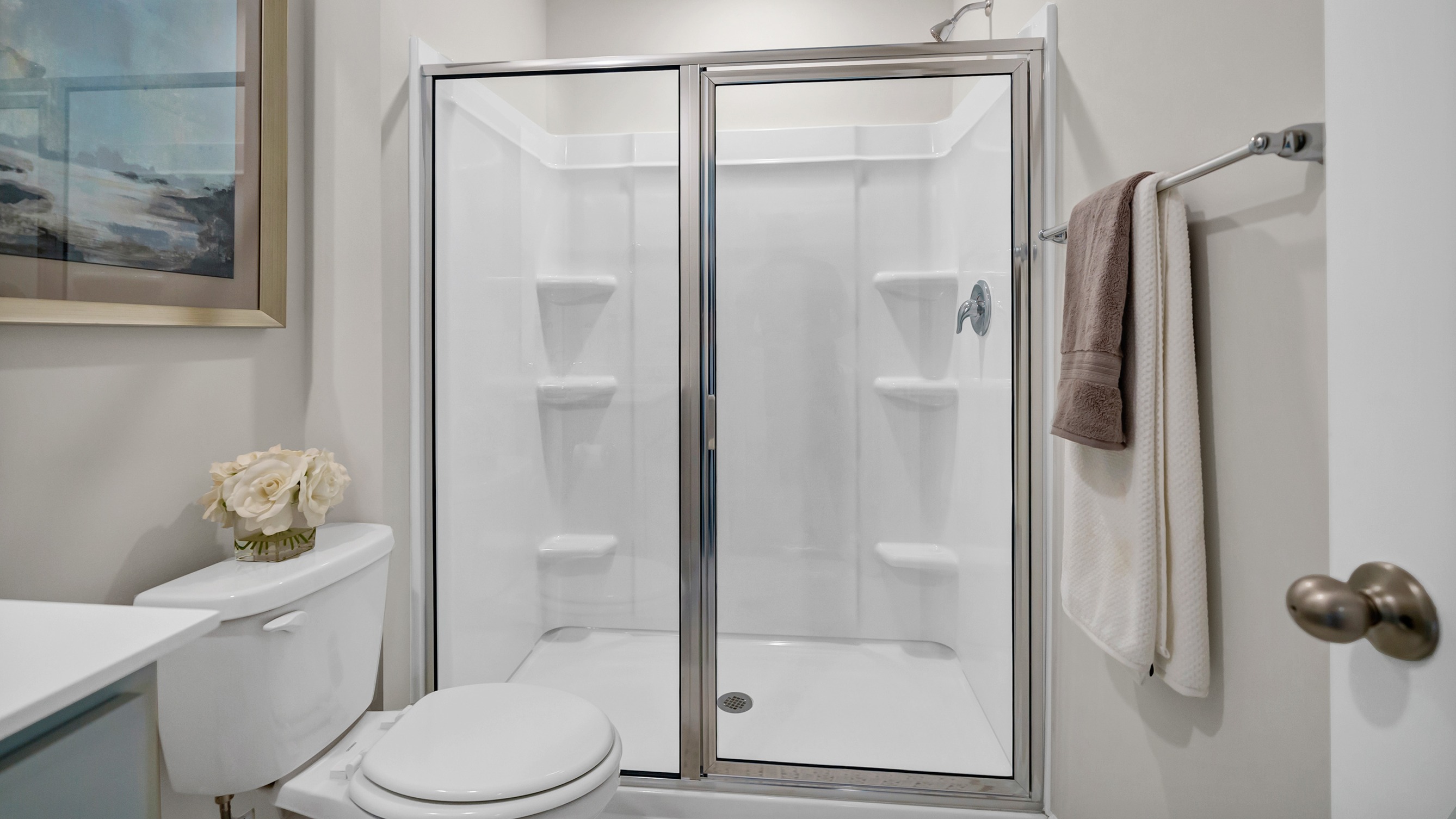 The downstairs bathroom features a standup shower