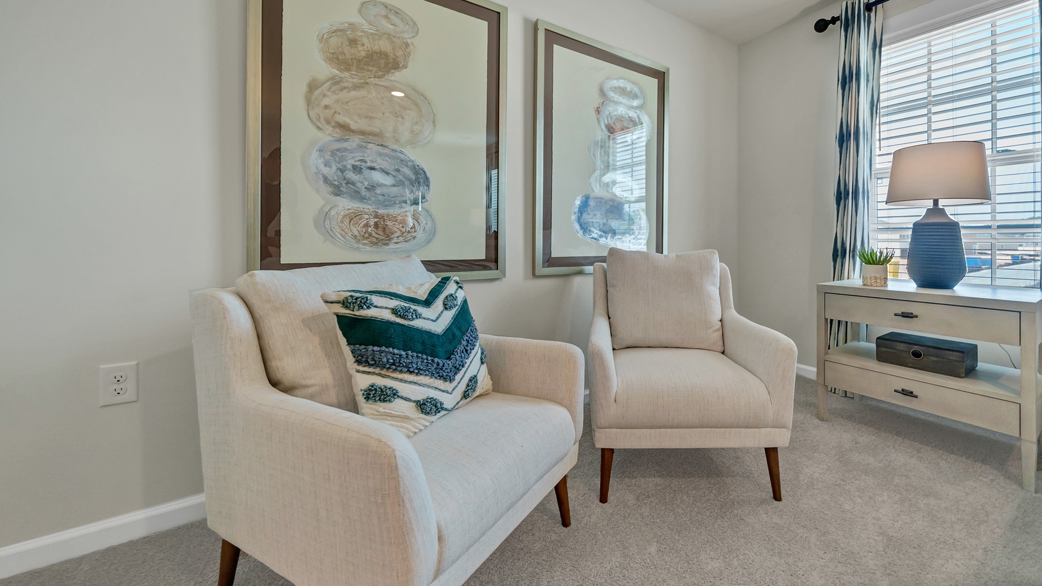 Spacious primary bedroom with room for a king bed set and additional sitting area