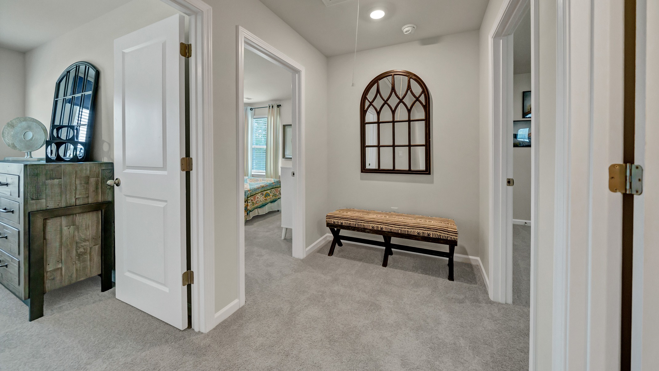 Hallway connecting upstairs bedrooms