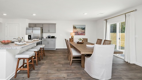 Barstool seating and dining room table seating.