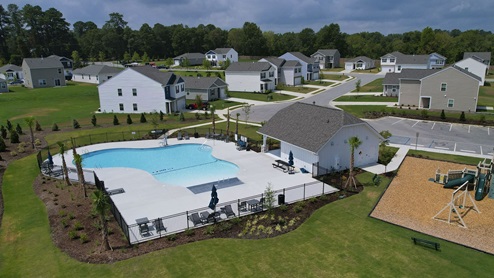 The pool and playground are side by side