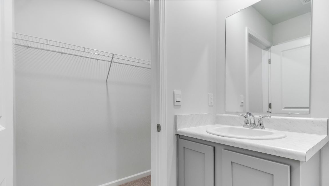 Walk-in closet in the primary bathroom
