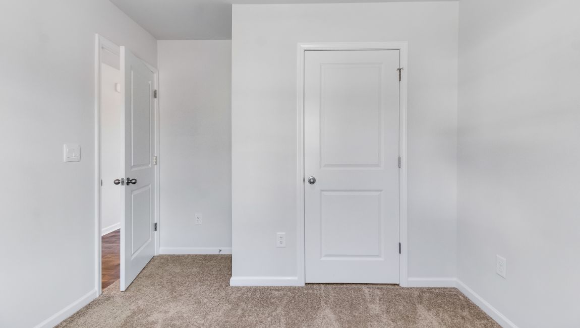 Private closet in front bedroom 2 of the Hannah in The Park at Wilkinson