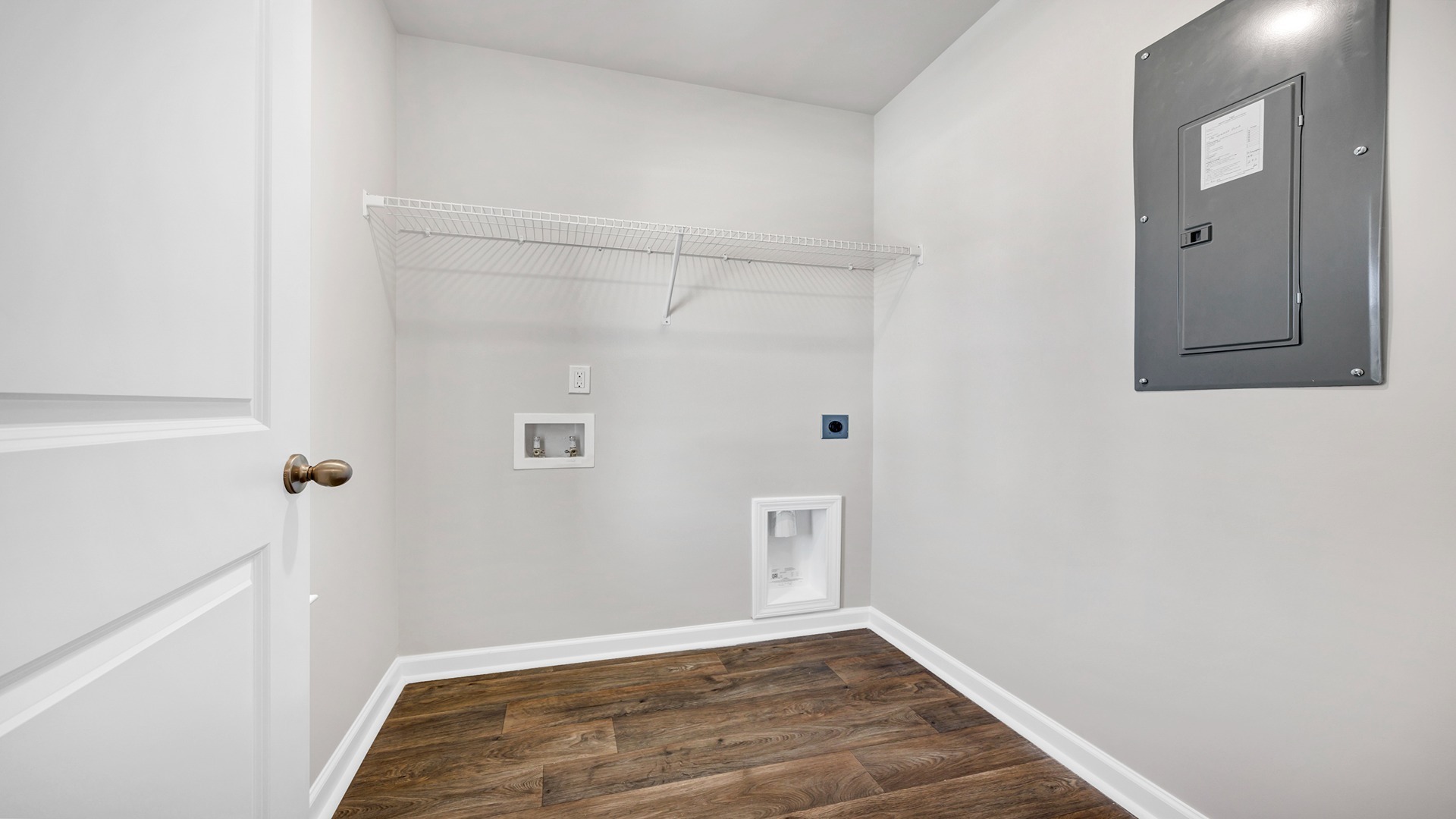 Laundry room at the front of the home