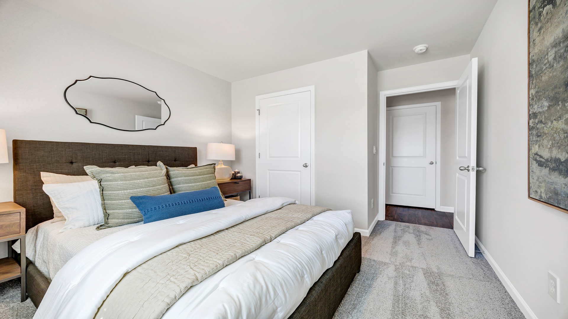 Private closet and neutral-colored painted walls