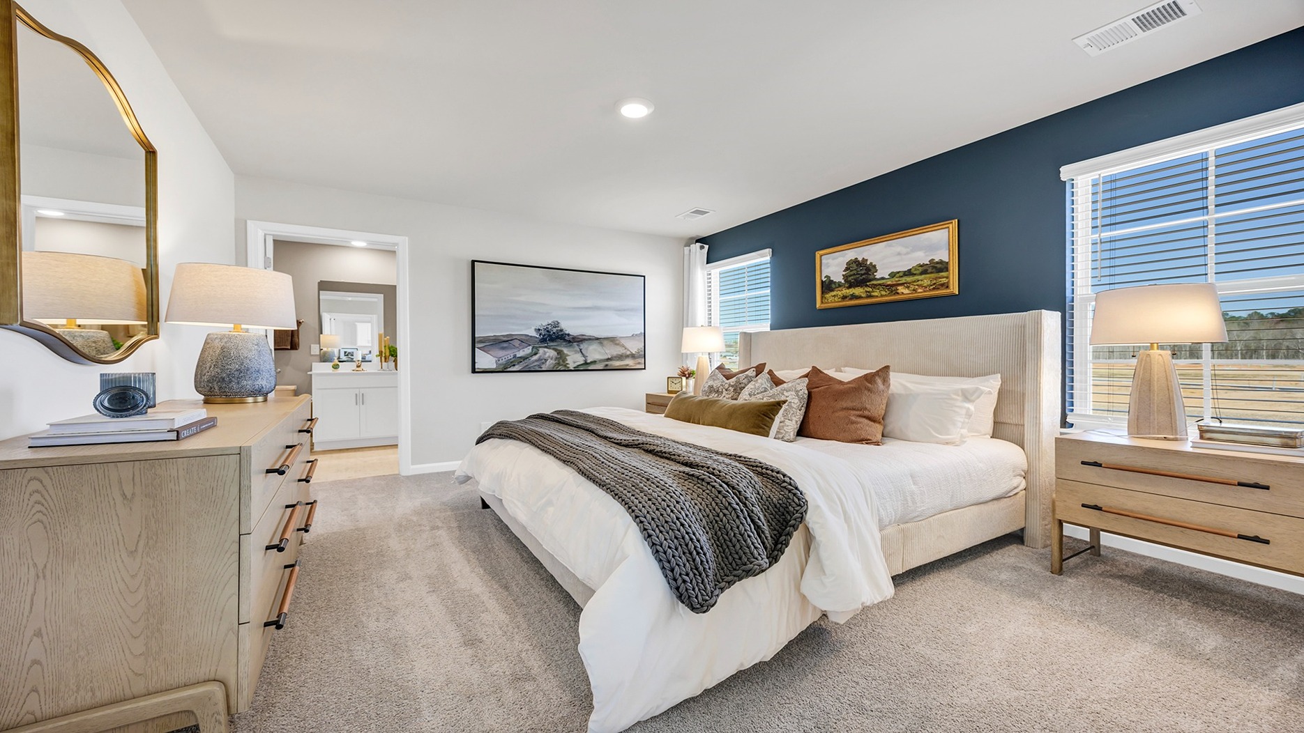 Primary bedroom comfortably fits a king or queen bed.