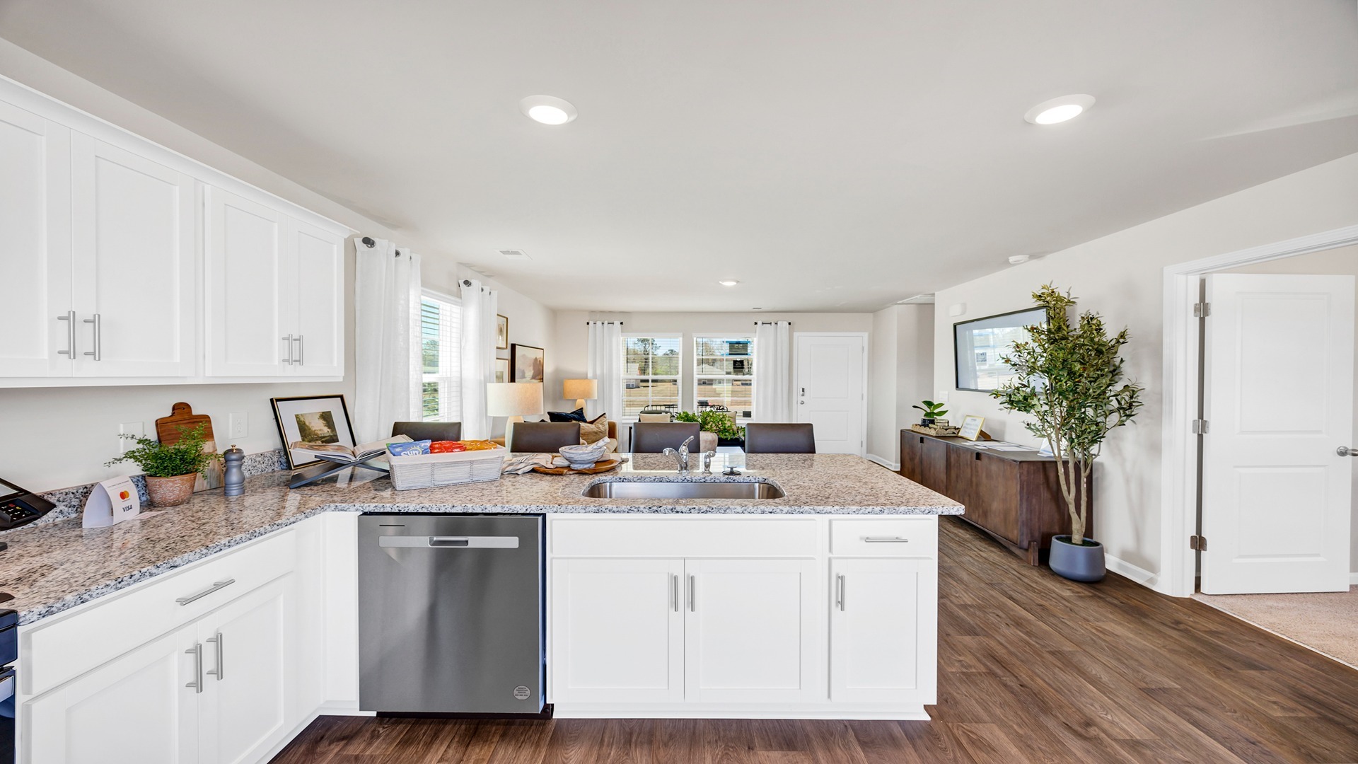Kitchen bar overlooks the living area