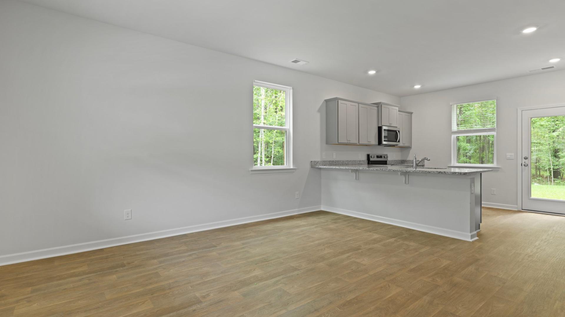 Open kitchen and dining areas