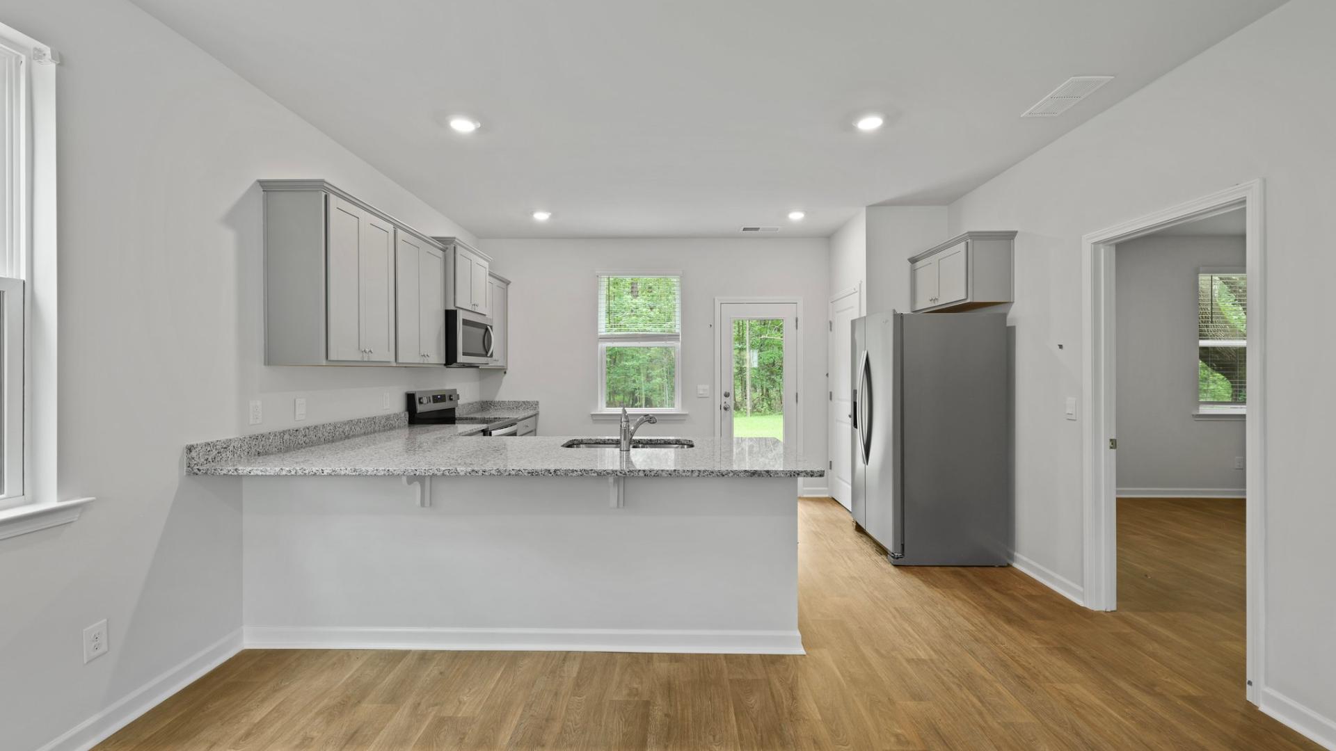 Curtis kitchen area with a kitchen bar