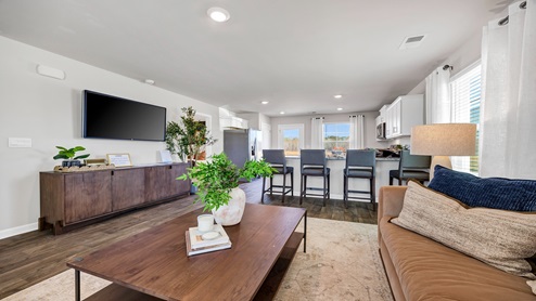 Open concept kitchen and living spaces.