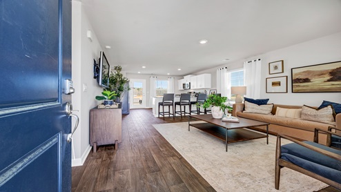 End up back at the front door at the front of the living space.
