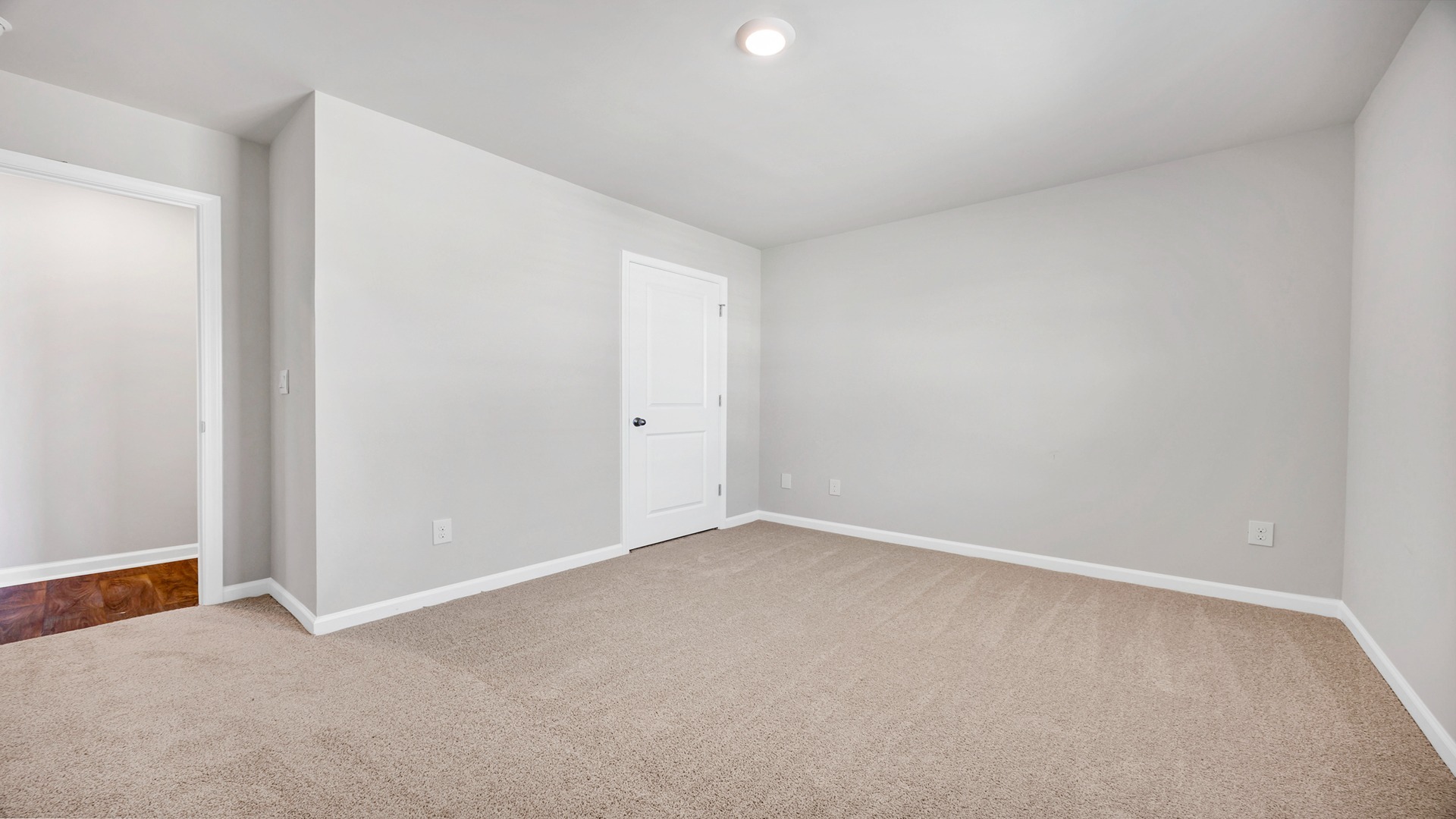 Plush carpet and a private closet in Lewis bedroom 2