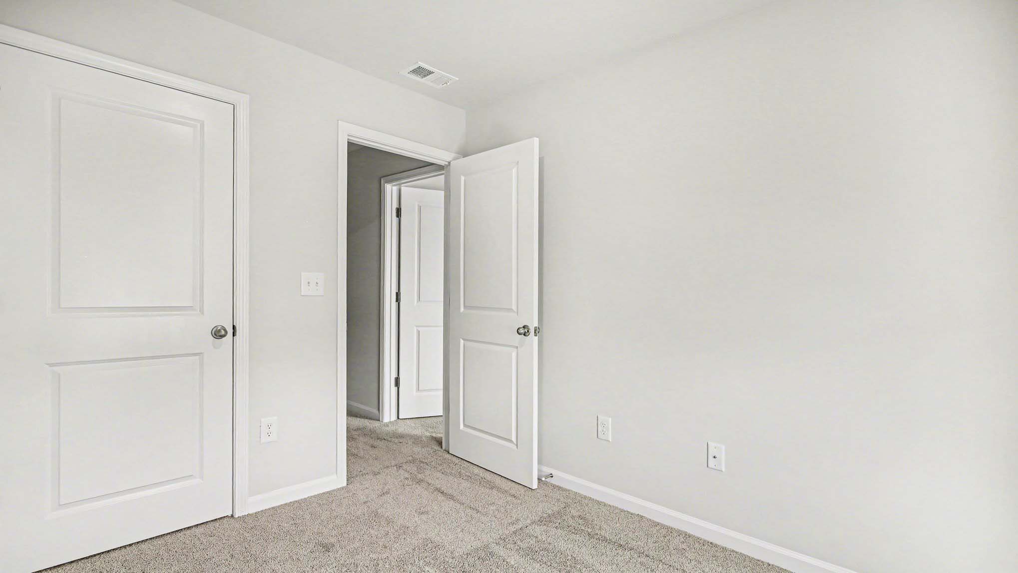 Private closet and carpet in bedroom 2