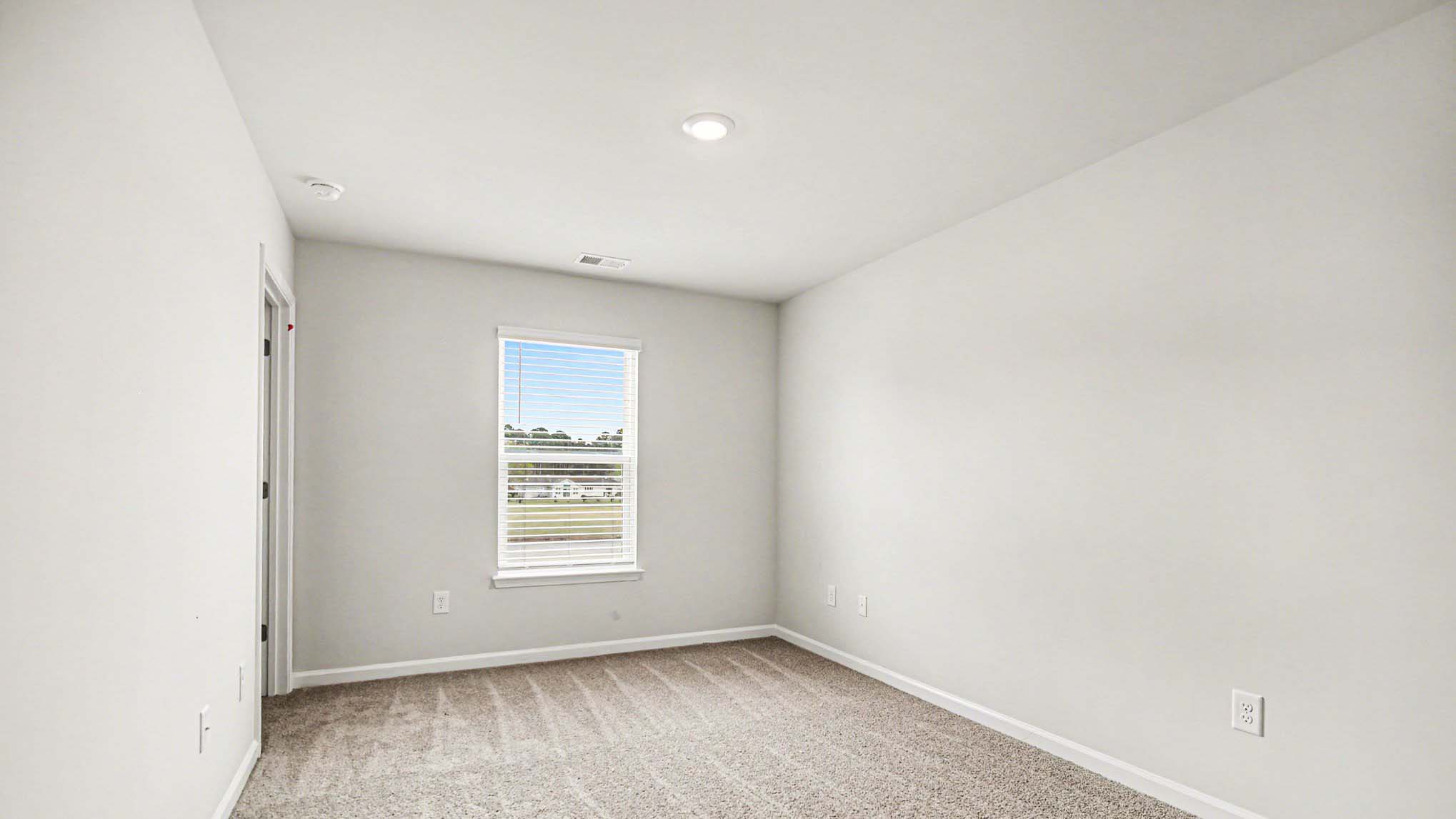 Primary bedroom upstairs in the in Ranger floorplan