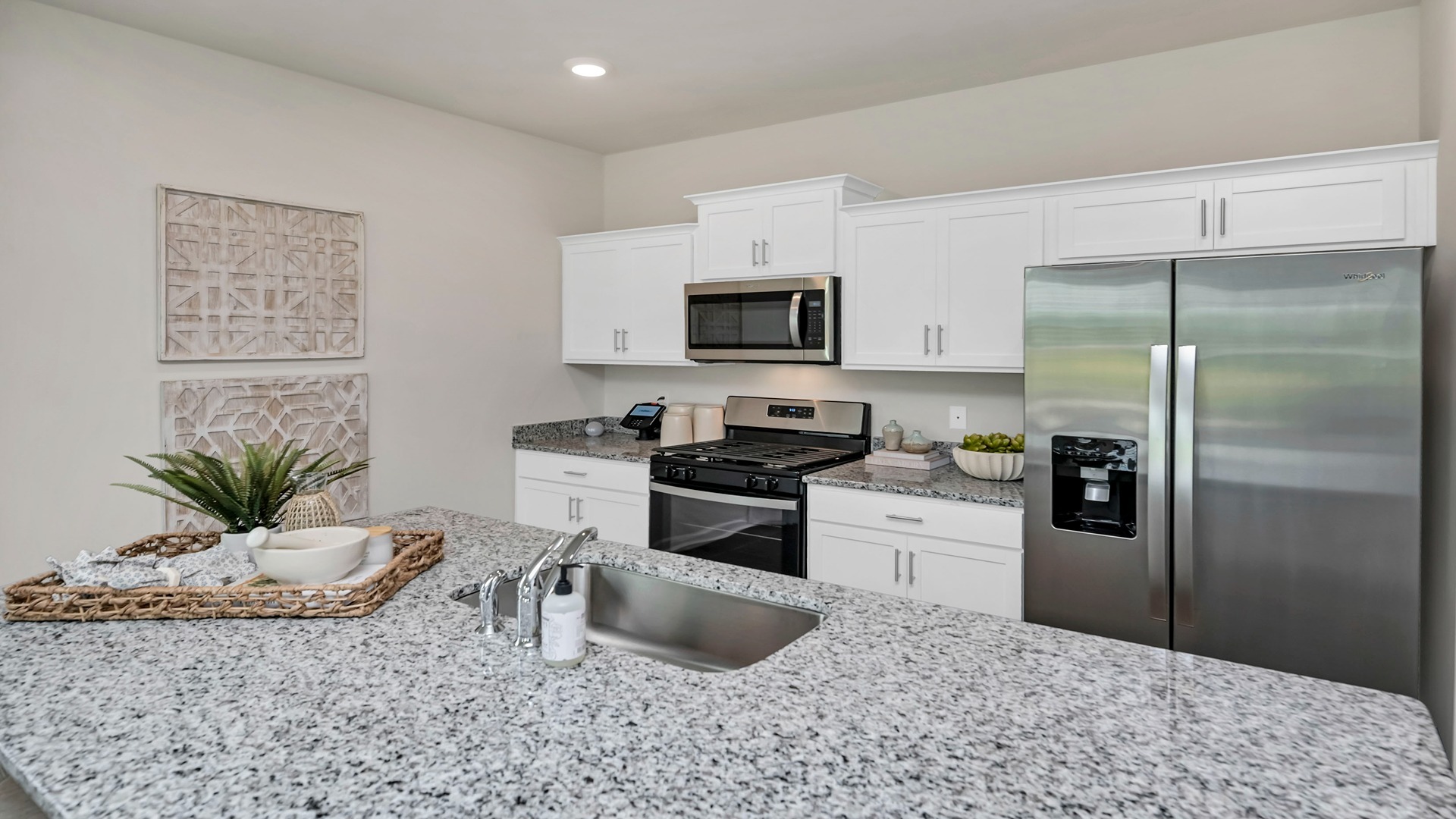 Will have white, quartz countertops instead of granite