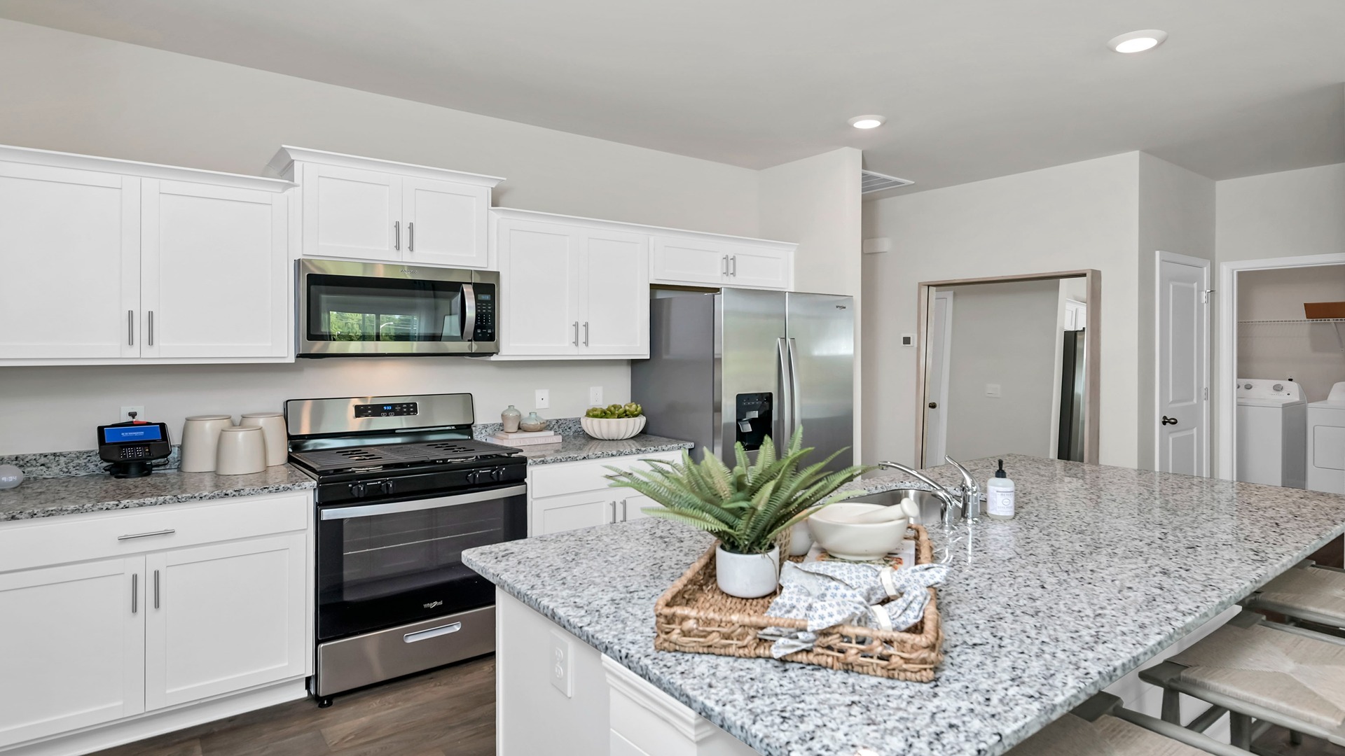 The Devon kitchen features a floating kitchen island.