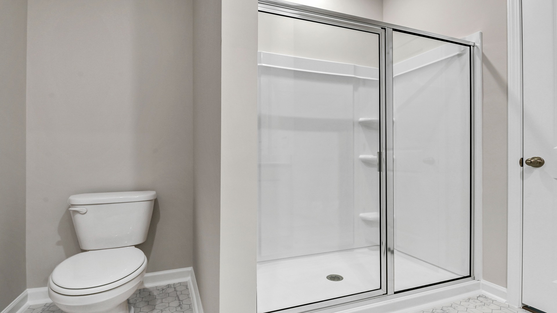 En-suite primary bathroom with walk-in shower