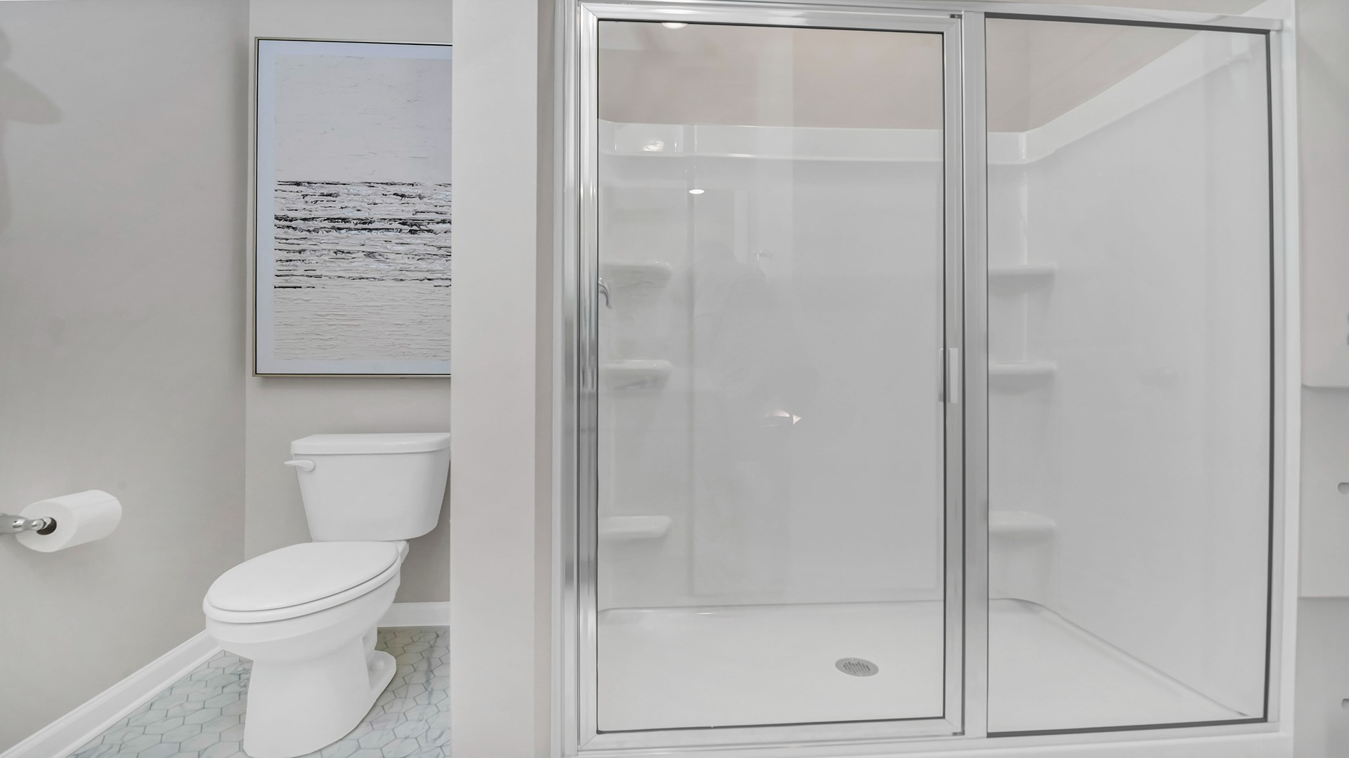 Primary standup shower with glass doors