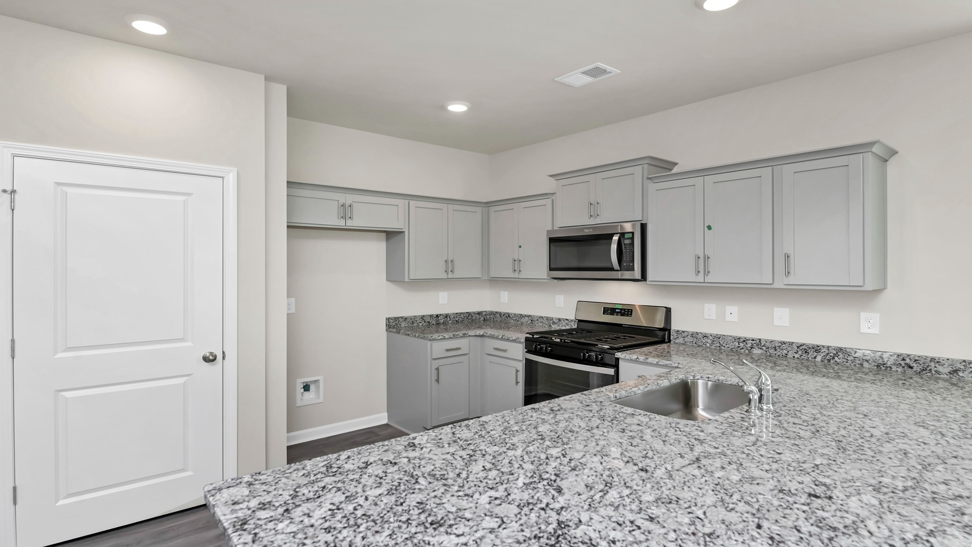 There will be white quartz countertops in this home instead of granite