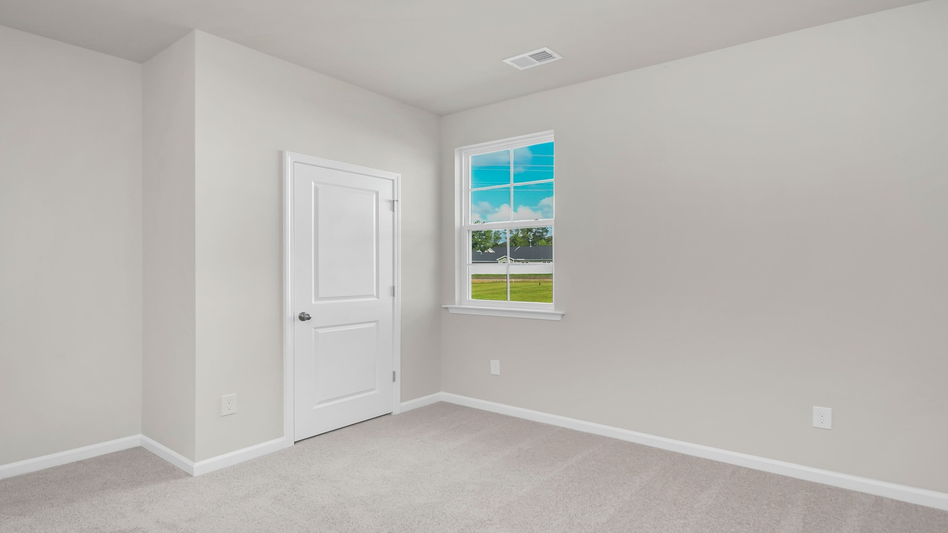 Bedroom 4 with a window and carpet flooring
