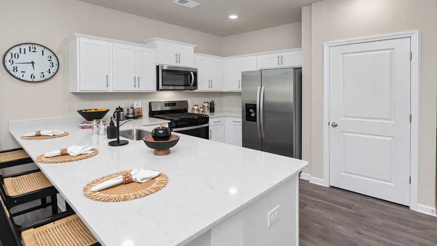 Cameron floor plan kitchen with quartz countertops and white cabinets