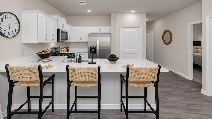 Kitchen bar in new home for sale with space for barstool seating
