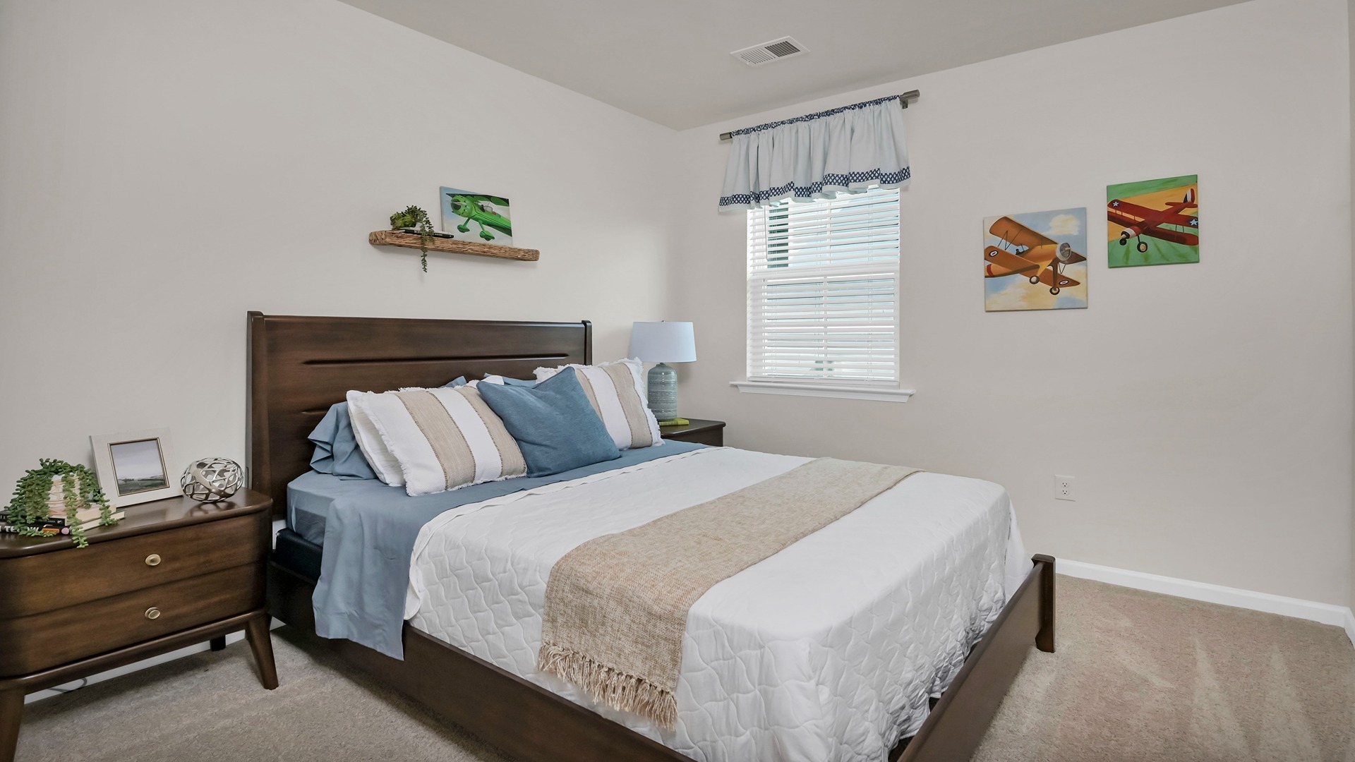 Bedrooms 2 and 3 are towards the front of the one-story home