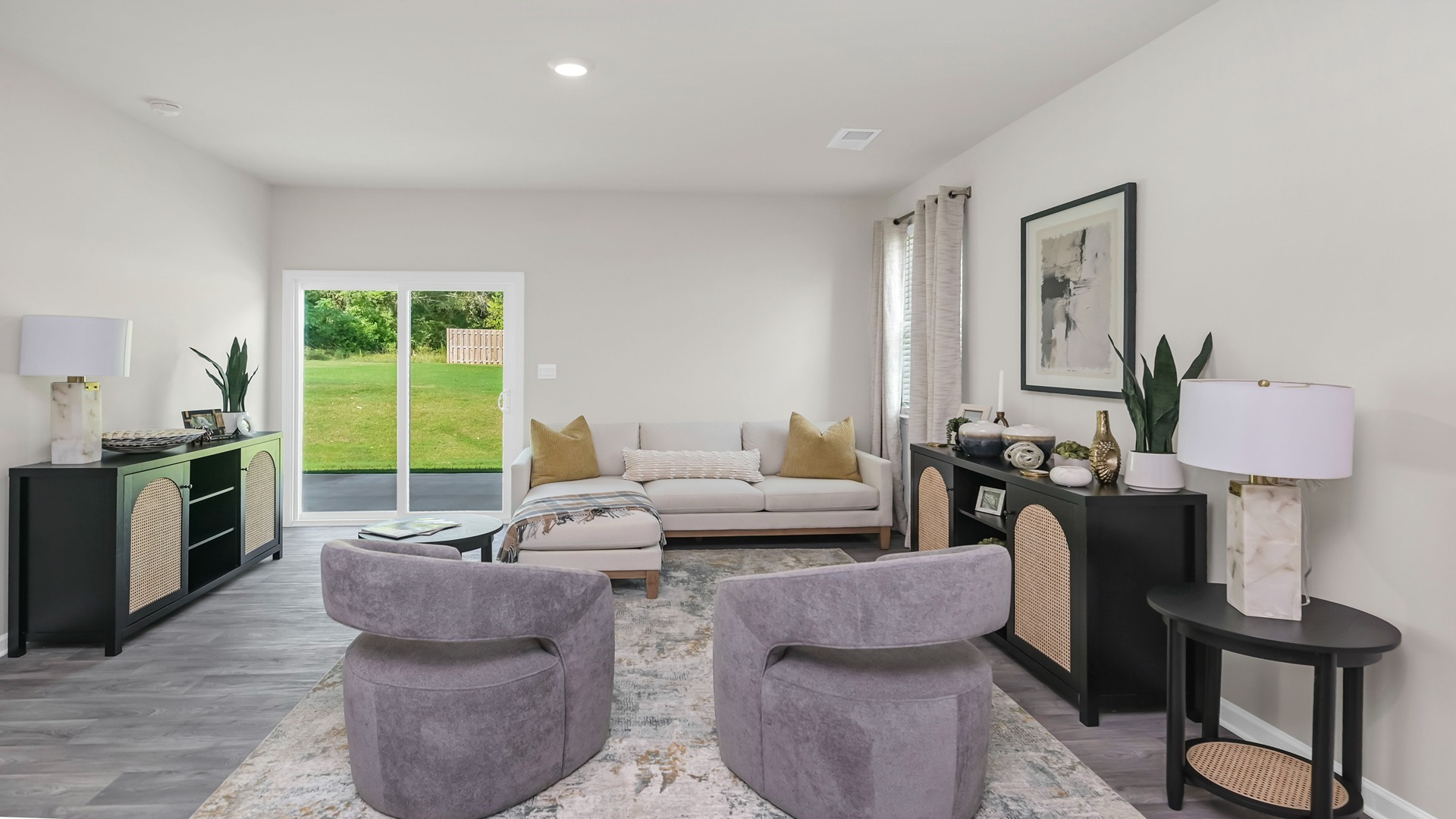 Living area of home for sale in Lexington, SC with neutral painted walls and vinyl floors