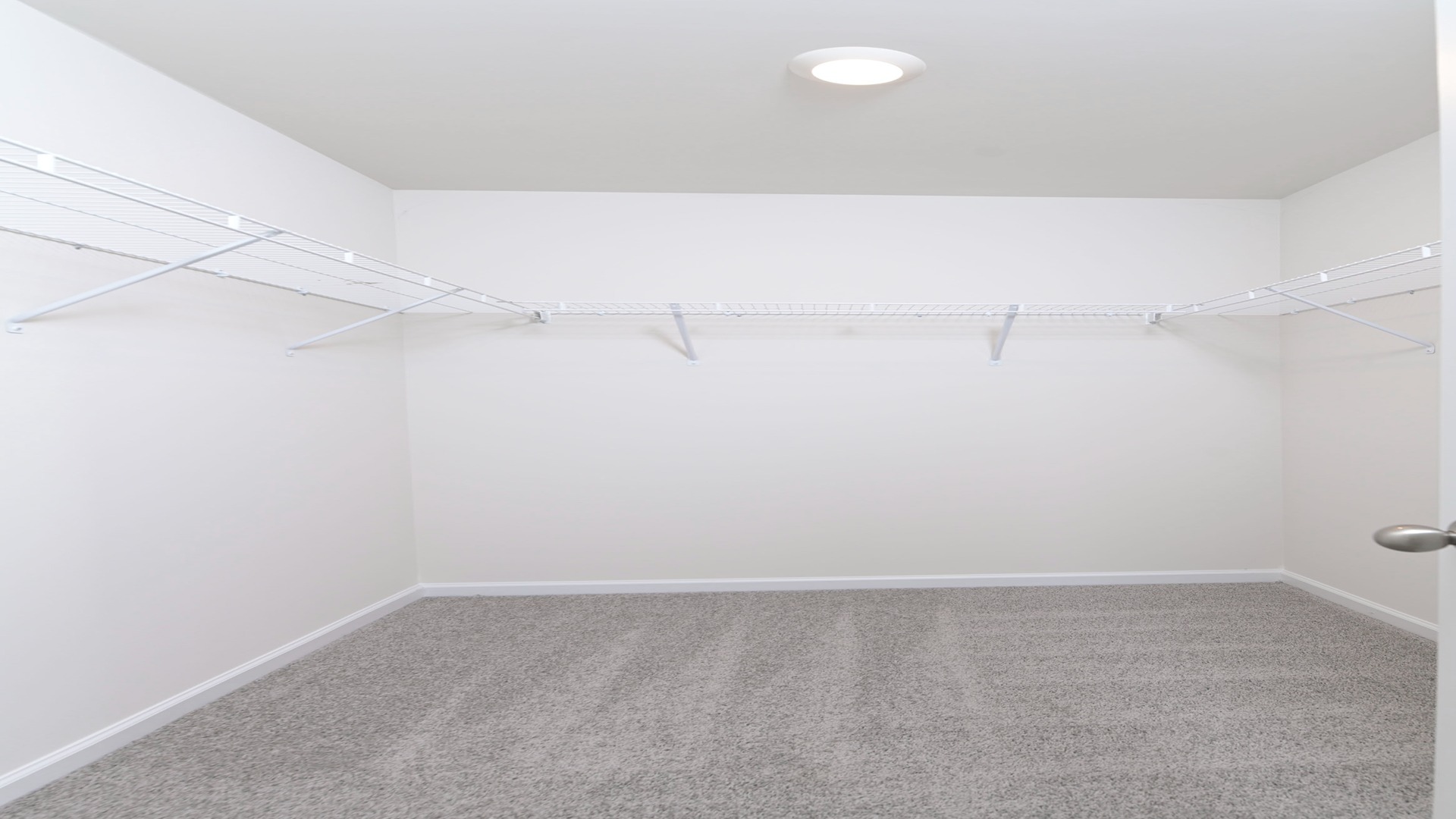Spacious walk-in primary closet