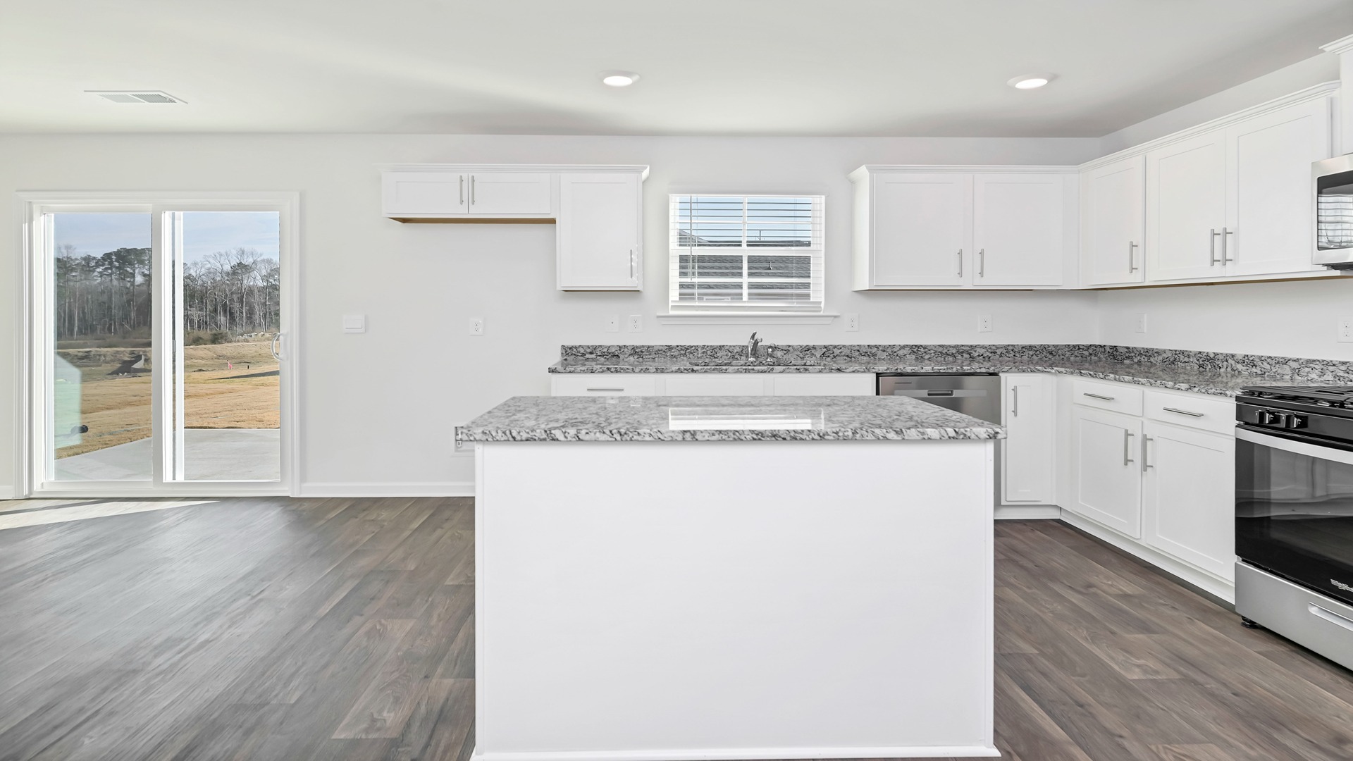 Matching vinyl flooring in kitchen and dining areas