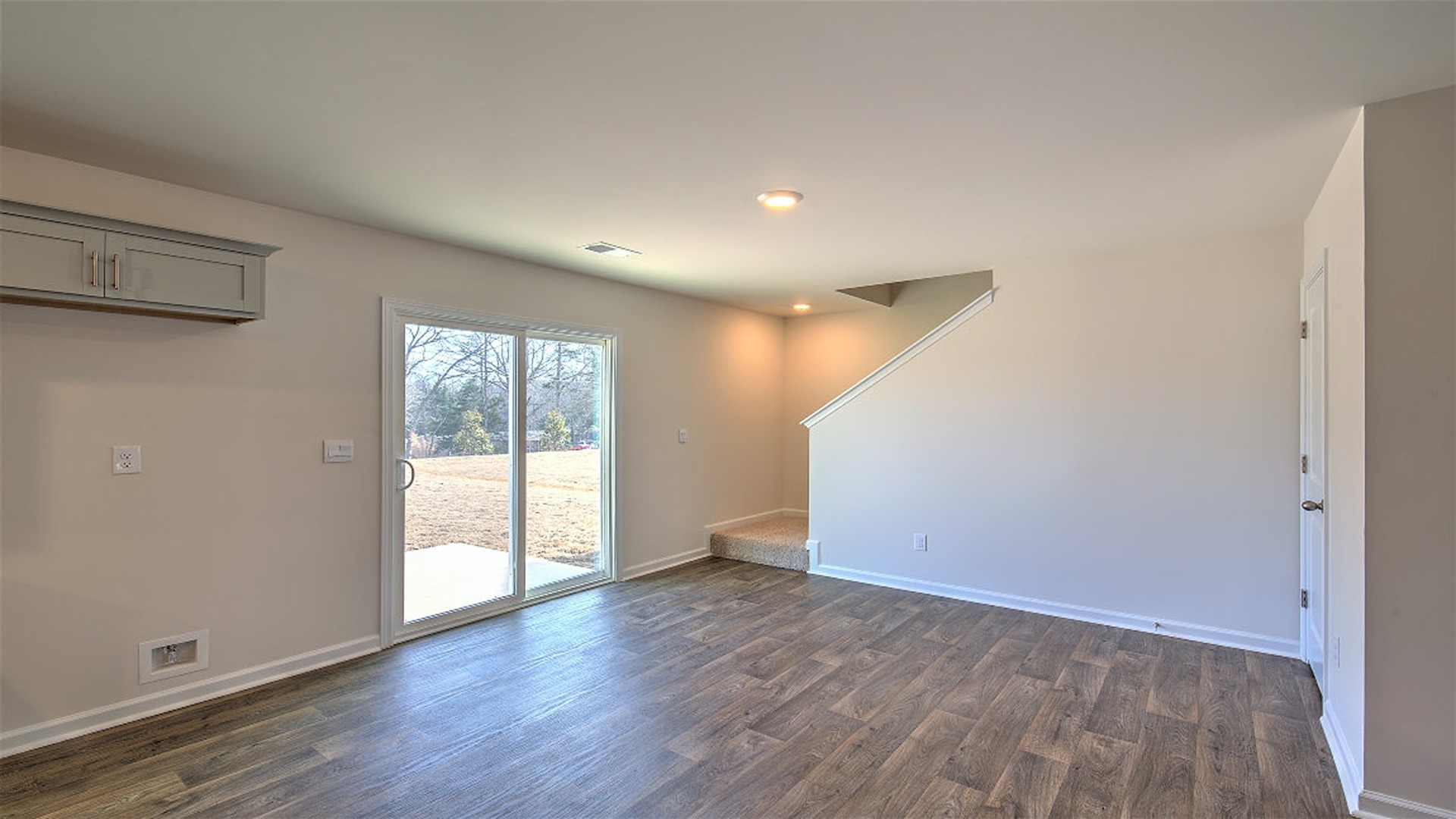 Dining area with glass sliding doors that lead to the back patio