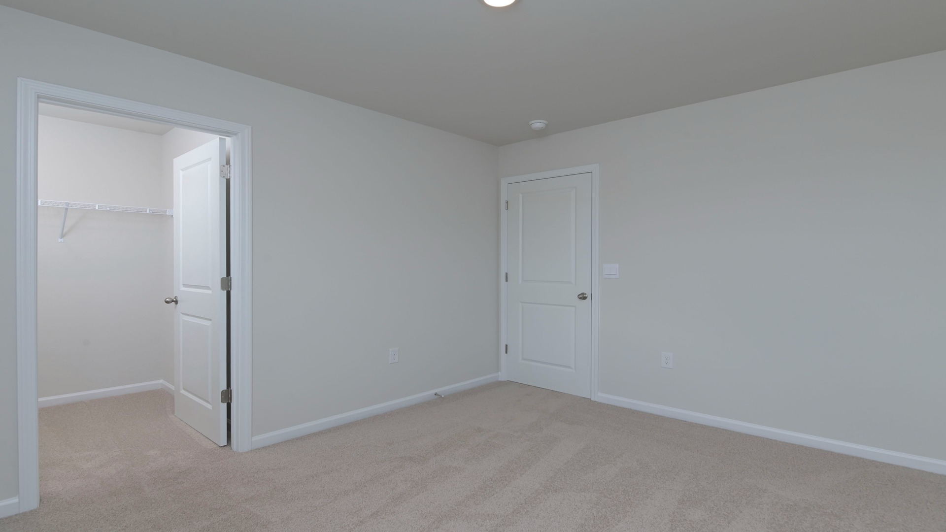 Bedroom 4 with walk-in closet in 4-bedroom home in Ferry Grove