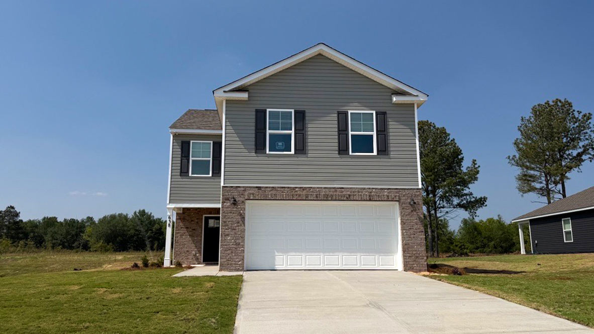 Two-story home with 2-car garage and partial brick front for sale in South Carolina