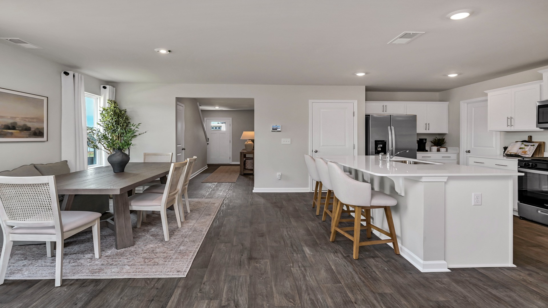 Completely open concept dining and kitchen areas right off the Robie front foyer